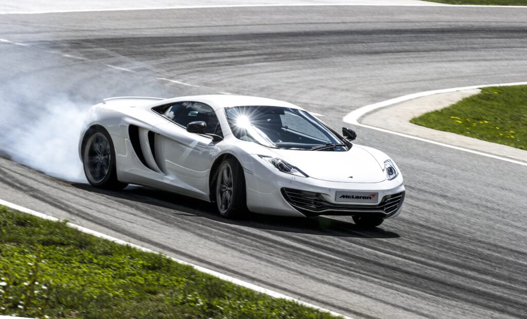 white Mclaren MP4-12C drifting