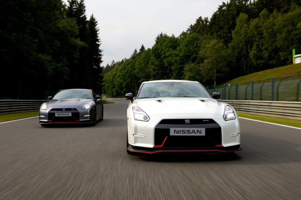 Two Nissan R35 GT-R Nismos on a track